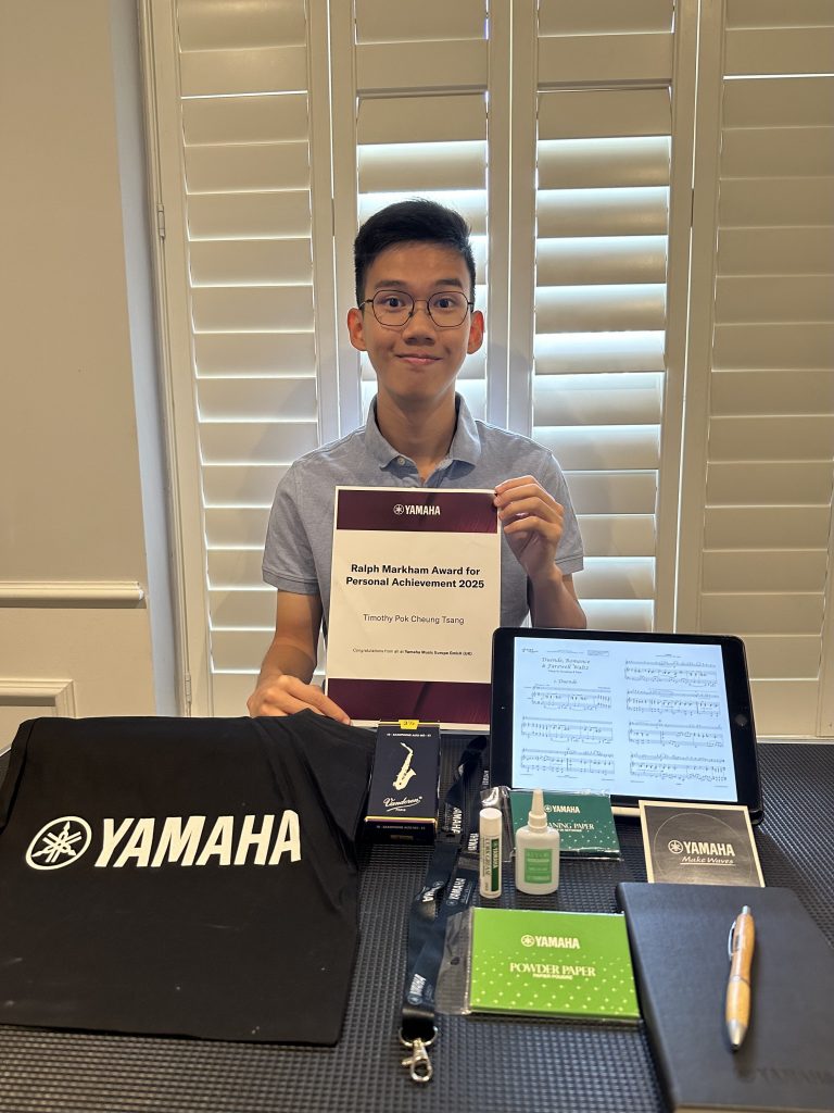 Timothy Tsang with gifts from Yamaha, Vandoren, Saxtet